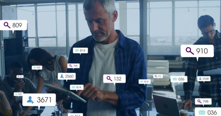Poster - Image of changing numbers, icon in notification bars, caucasian man using digital tablet