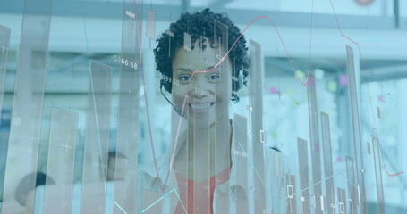 Poster - Image of data processing over african american woman wearing phone headset smiling at office