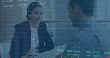 Poster - Image of data processing against diverse businessman and businesswoman discussing over documents