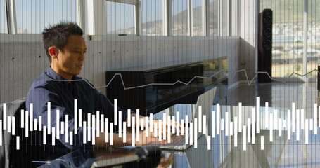 Poster - Image of financial data processing over asian businessman using laptop