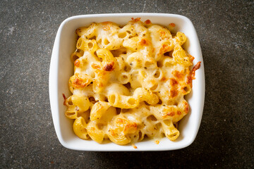 Wall Mural - American mac and cheese, macaroni pasta in cheesy sauce