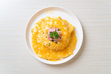 Wall Mural - Creamy Omelet with Ham on Rice