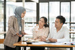 © aekachai - Group of business people meeting and present work on the board