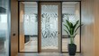© ngstock - Picture a flat design of a glass door with a companys name and logo in vinyl