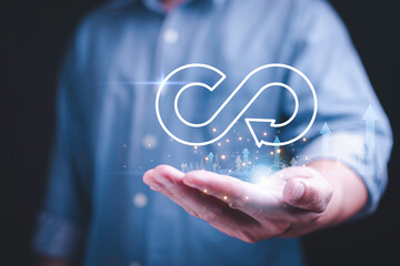 Infinity icon on a graph charting eco-friendly business growth. Explore how circular economy principles drive sustainable development and profit.