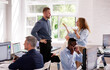 © Andrey Popov - Angry Office Business Meeting Argument. People Arguing