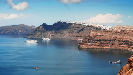 Wall Mural - Santorini island, Greece. Panoramic view of the island at sunny day. Cruise ship near the island. Blue sea and the blue sky with clouds. Famous travel destination
