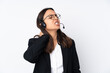 © luismolinero - Young telemarketer woman isolated on white background with neckache
