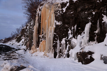 Wall Mural - Ice waterfalls in Abisko national park in Sweden.