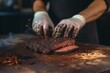 © alisaaa - bbq chef cuts deliciously tender smoked brisket slices