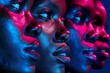 © volga - Colorful neon paint on models' faces in artistic studio lighting