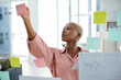© peopleimages.com - Glass, problem solving and sticky notes with business black woman in office for brainstorming or planning. Agenda, moodboard and schedule with employee in workplace for development of company vision
