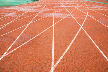 Bright red runway interweaves the straight white trajectory with the curved white trajectory.