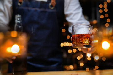 Wall Mural - Bartender Serve beer, on wood bar, 