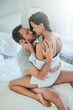 © peopleimages.com - Bed, morning and couple in home for love, intimacy and foreplay for romance, lust and desire together. Marriage, sex and man and woman embrace in bedroom for bonding, relationship and affection