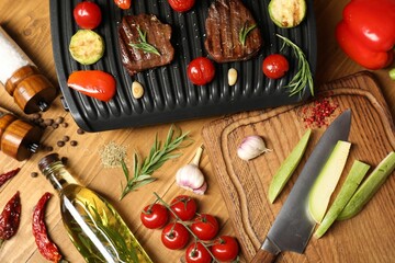Wall Mural - Flat lay composition with electric grill and different products on wooden table