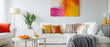 © Starkreal - Bright and inviting living room with white wall and colorful decor