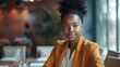 © WS Studio 1985 - black businesswoman delivering a powerful presentation in a modern boardroom, her confidence radiating as she commands the room's attention