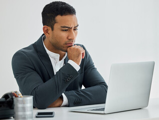 Wall Mural - Confused, businessman and thinking with laptop in office for response or feedback on company project. Male person or employee and computer with idea or vision for planning on proposal criticism