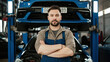 © Luluraschi - portrait of caucasian male car mechanic at mechanical workshop