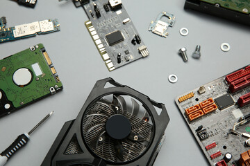 Poster - Graphics card and other computer hardware on light background, above view