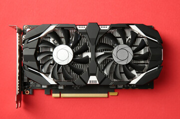 Poster - Computer graphics card on red background, top view