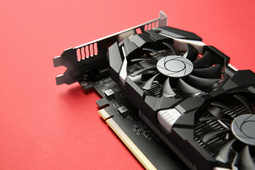 Poster - Computer graphics card on red background, closeup