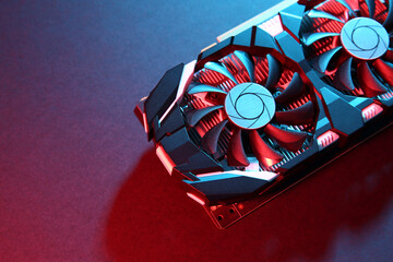 Poster - Computer graphics card on color background, top view. Space for text