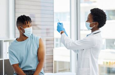 Wall Mural - Doctor, patient and injection at hospital with safety gear for virus, medicine for wellness. Female nurse, man and healthcare in clinic with syringe for flu vaccine, test or check for air bubbles