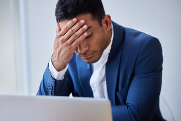 Wall Mural - Headache, depression and business man on laptop in office with burnout, taxes or bad news of bankruptcy email. Stress, migraine and professional with fatigue, anxiety or sick of financial crisis debt