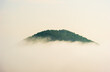 © Andrew Kornylak - A mountainside peeking through morning fog near Helen, Georgia