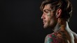 © PaulShlykov - Back view of tattoed bodybuilder with outstretched arms