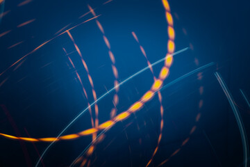 Wall Mural - a blurry blue and orange swirl. the blue and orange colors create a sense of movement and energy. th
