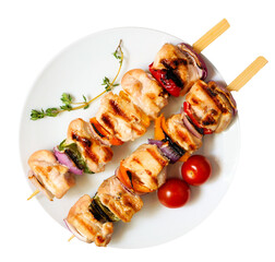 Poster - Grilled chicken and vegetable skewers. Overhead view plate isolated on a white background.