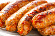 © Iryna - Grill or smoked sausage. Barbecue food.