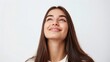 © Irina.Pl - Dreamy young woman smiling and looking upwards on white background