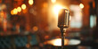 © Gabriela - Old microphone on blurred bar background closeup