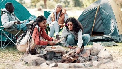 Poster - Camping, nature and women with wood for bonfire, adventure or weekend trip in forest. Tent, stone and group of friends with sticks for vacation, holiday or prepare flame in outdoor woods together