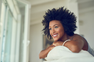 Poster - Black woman, relax and thinking on sofa in home with happiness and ideas for future. Remember, memory and girl with a smile in calm morning in living room of apartment with inspiration or positivity
