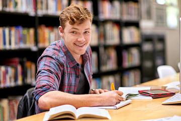 Poster - Student, portrait and notebook in library for study, education and university quiz with pen on table. Man, happy and books on school campus for college exam, research and learning with scholarship