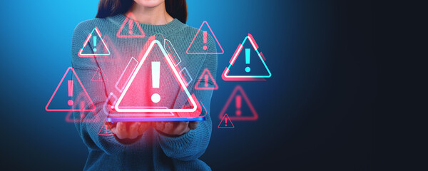 Poster - Woman holding a tablet with floating warning symbols, digital ar