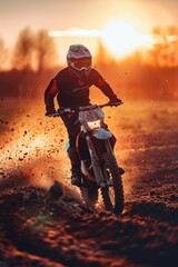 Wall Mural - A person riding a dirt bike on a dirt road. Perfect for outdoor sports and adventure concepts