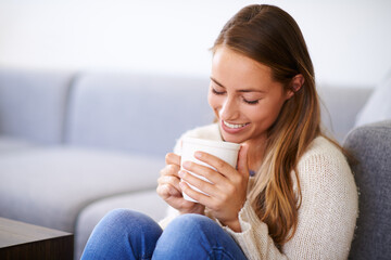 Poster - Happy, woman or coffee in living room for relax, peace or cappuccino in morning. Female person, smile or drink in apartment for wellness, thinking or mug in lounge by sofa for break, rest or caffeine