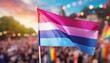 © Arthur - bisexual flag on the background of the pride parade, lgbt pride month, fight against homophobia, tolerance, rally of many people