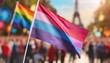 © Arthur - bisexual flag on the background of the pride parade, lgbt pride month, fight against homophobia, tolerance, rally of many people