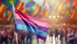 © Arthur - bisexual flag on the background of the pride parade, lgbt pride month, fight against homophobia, tolerance, rally of many people