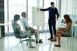© peopleimages.com - Man, presentation and people in boardroom meeting, business planning and white board brainstorming. Presenter, company and goals or idea with strategy, collaboration with professional for project
