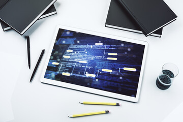 Poster - Modern digital tablet monitor with abstract programming language, research and development concept. Top view. 3D Rendering