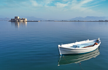 Poster - Small fishing boat and Bourtzi fortress in Nafplio, Peloponnese, Greece