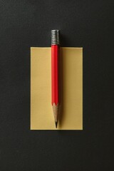 Aufkleber - A red pencil placed on top of a sheet of paper. Suitable for office and education concepts